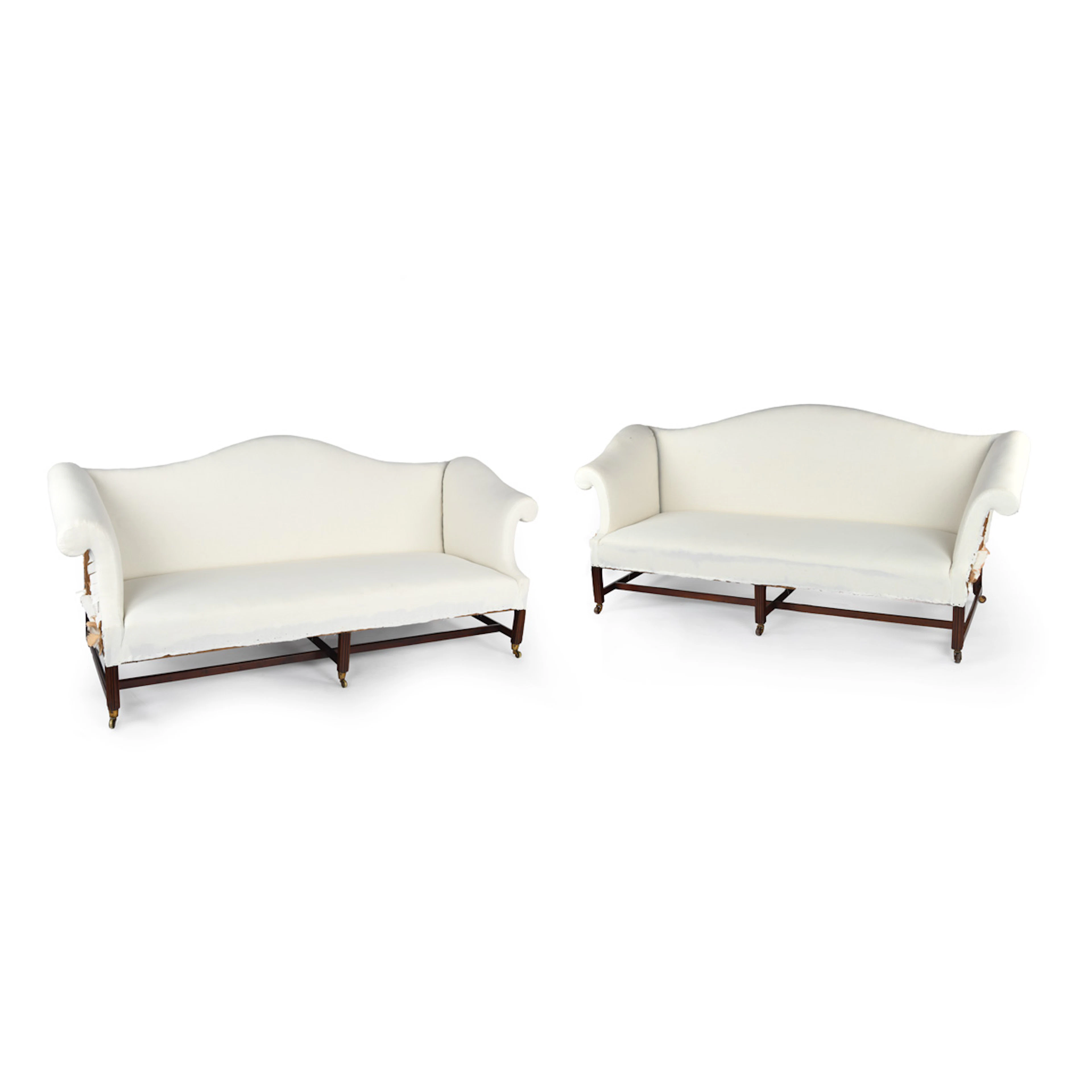 A pair of Georgian mahogany sofas from Powderham Castle sofas/settees