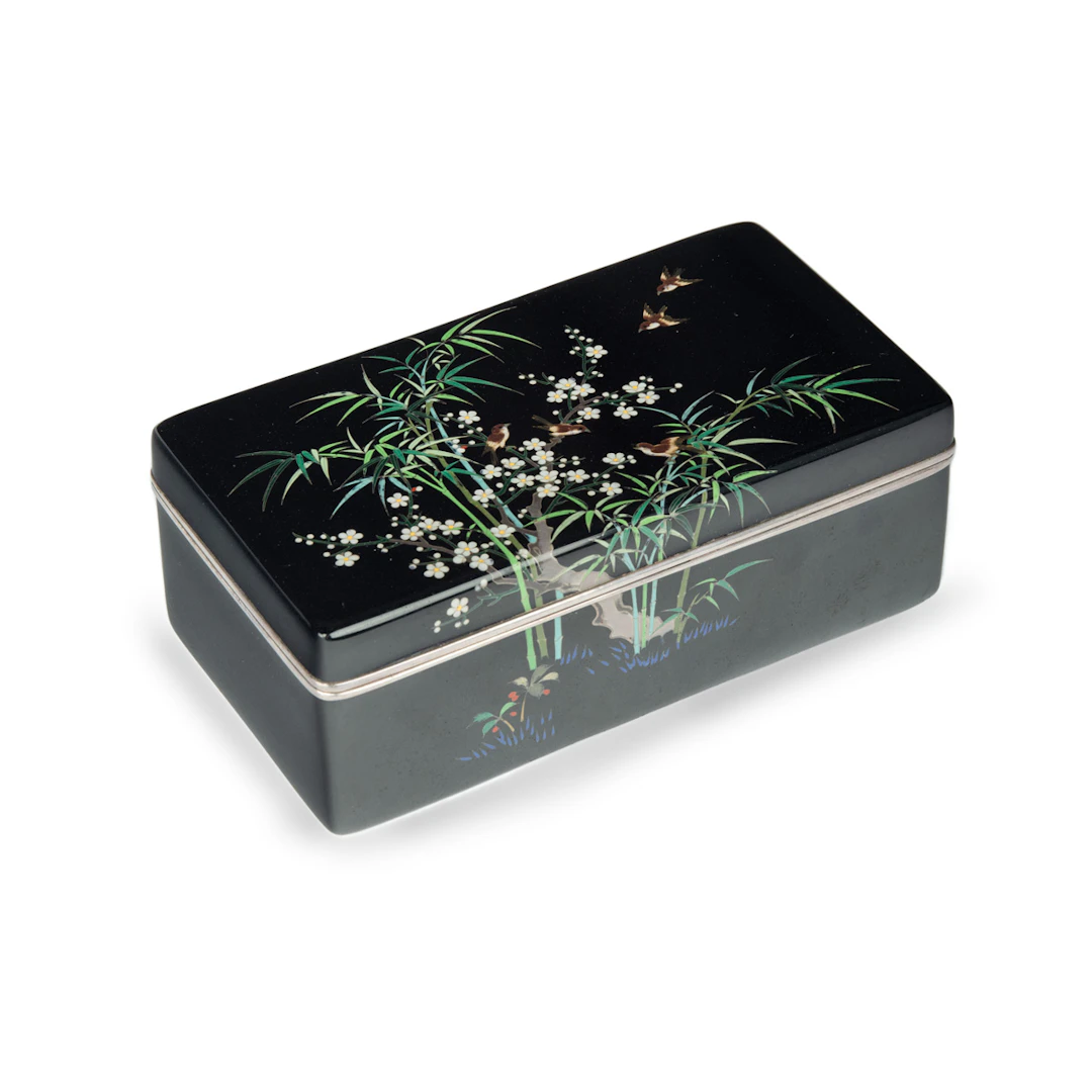 A Meiji period cloisonné box and cover with sparrows, prunus and bamboo