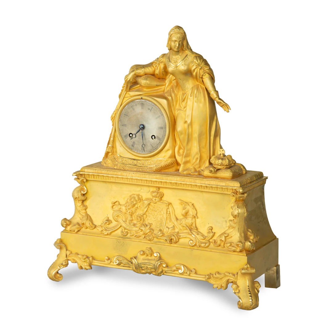 An ormolu mantel clock with Queen Victoria in medieval dress, by Monroux, 1843