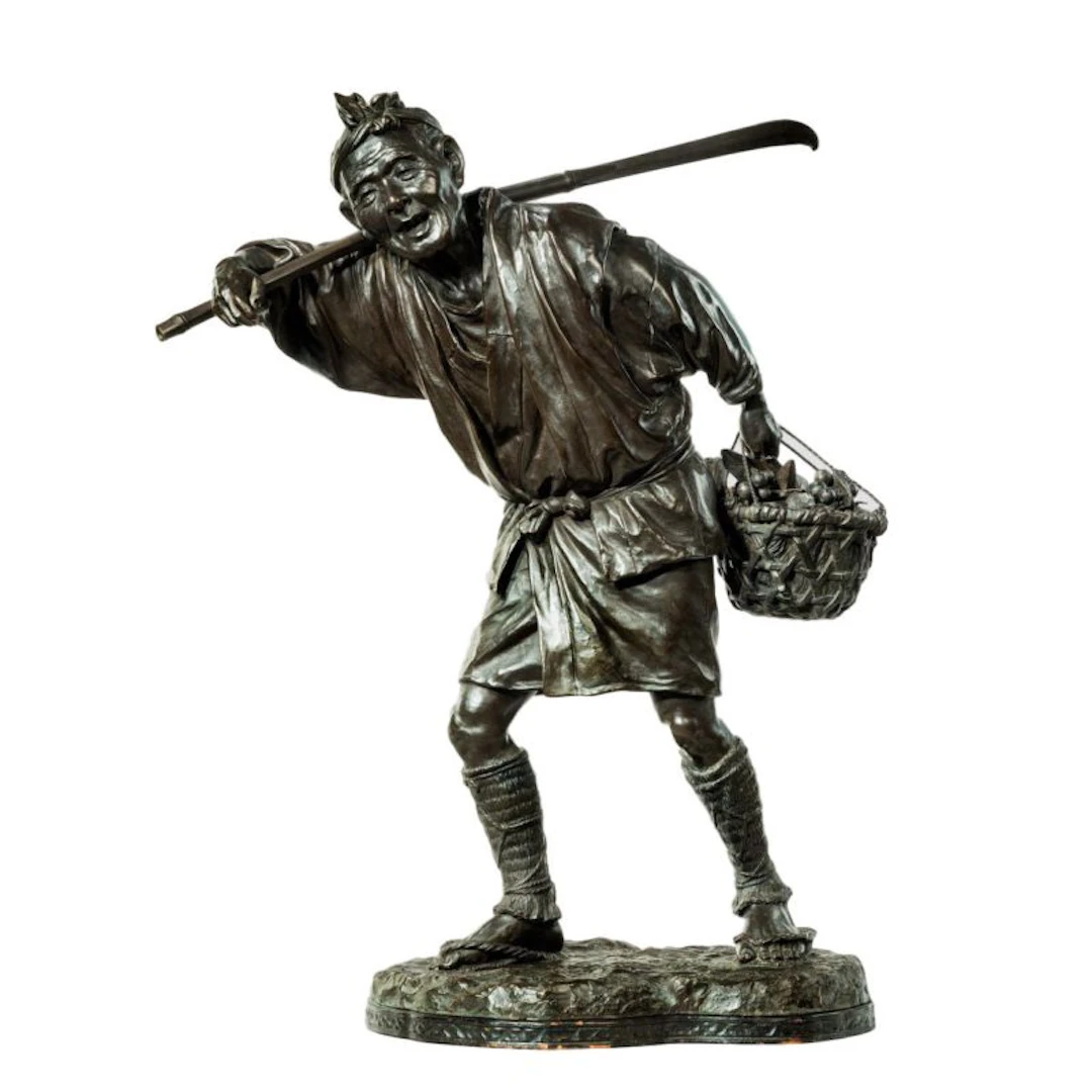 A fine Meiji period bronze of a fruit picker by UDAGAWA