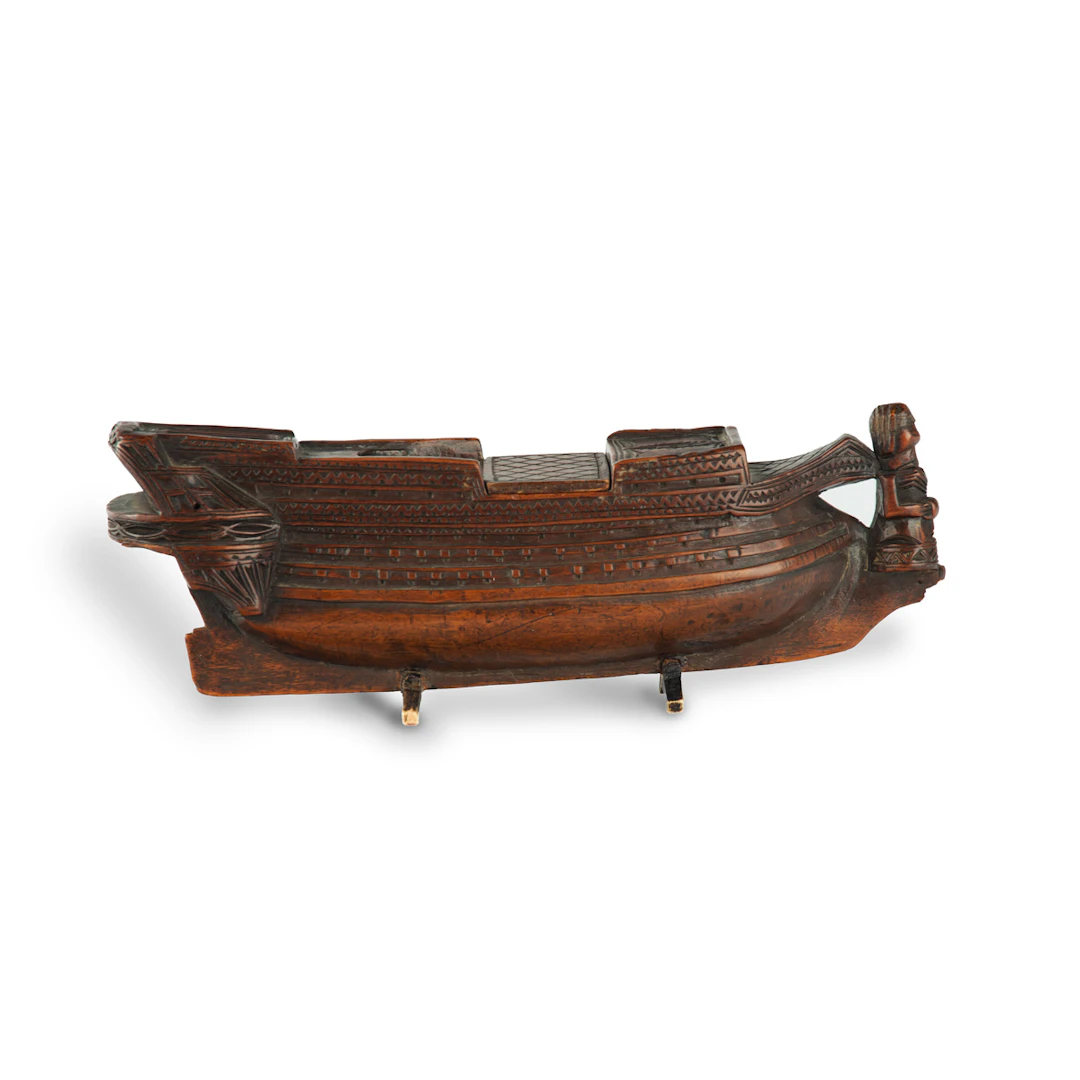 A carved boxwood prisoner of war battleship snuff box