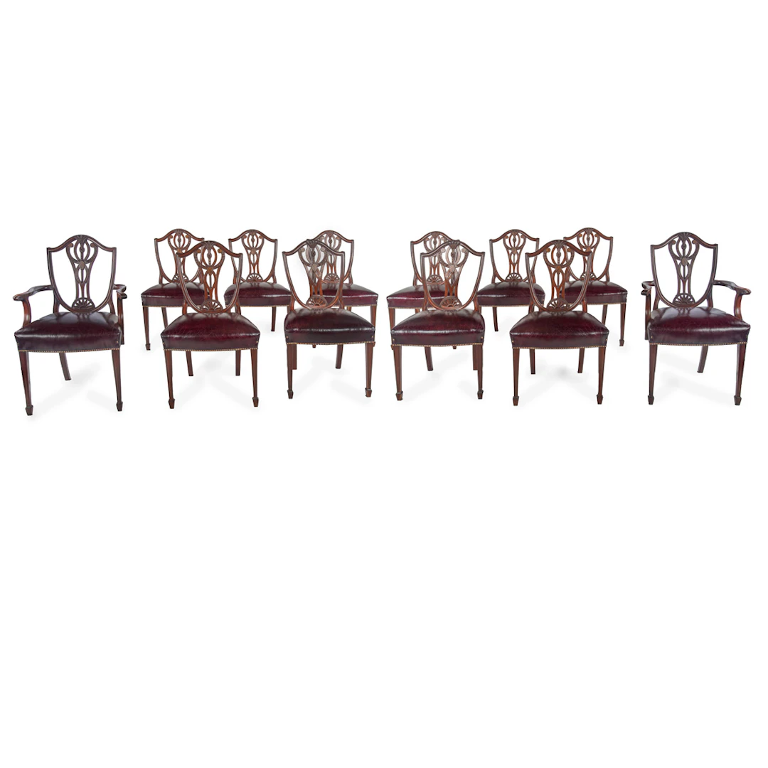 A Fine Set of 12 Edwardian Mahogany Dining Chairs in the Hepplewhite
