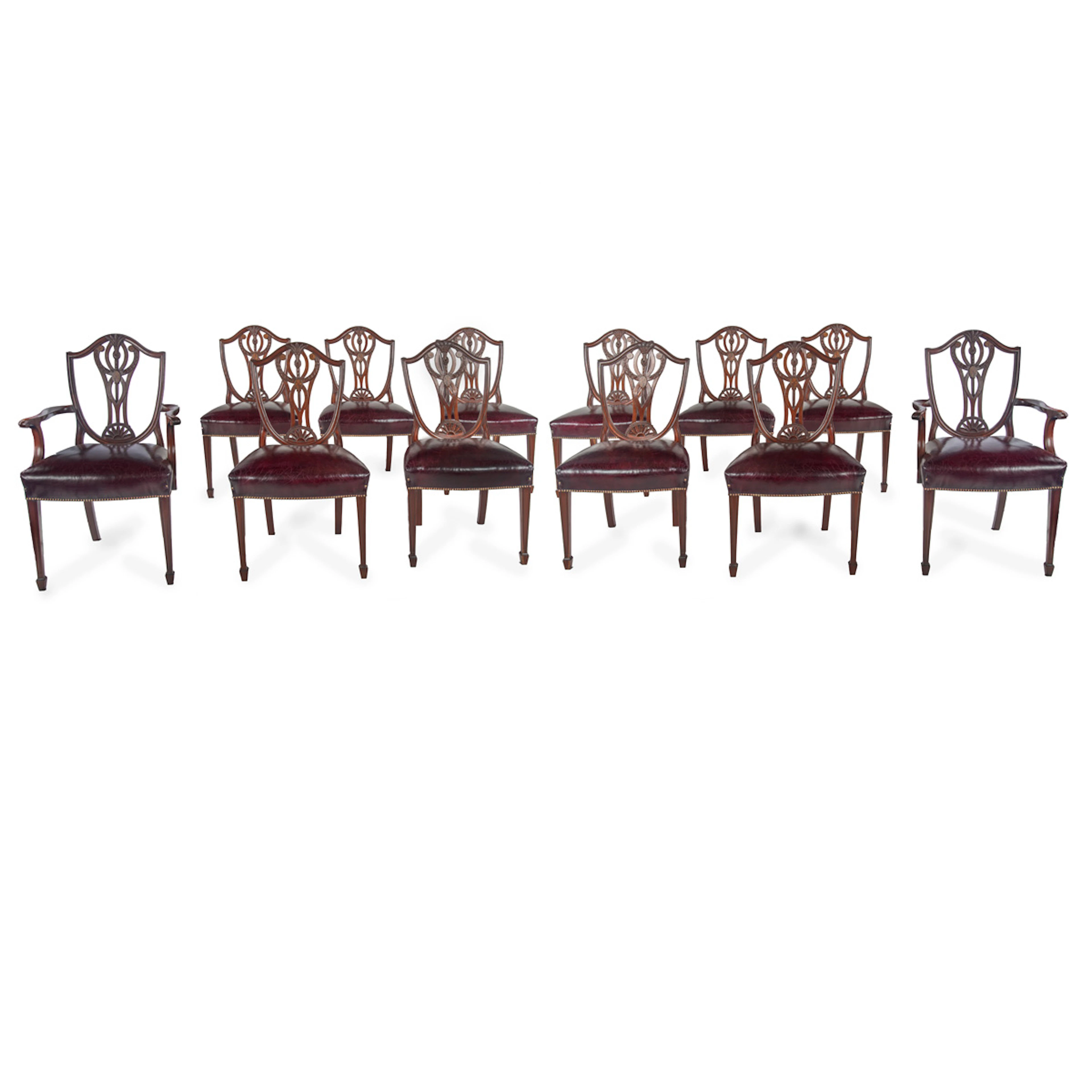 A Fine Set of 12 Edwardian Mahogany Dining Chairs in the Hepplewhite