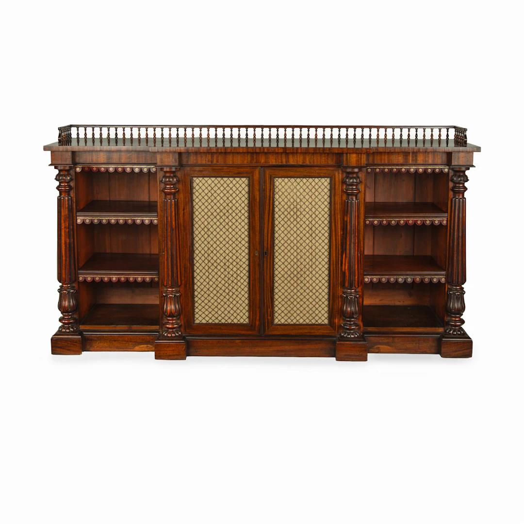 A late William IV rosewood breakfront open bookcase, by Gillows