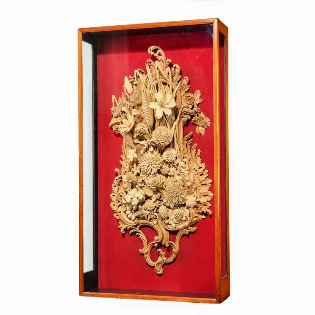 An exceptional carved lime and soft wood plaque by the carver James