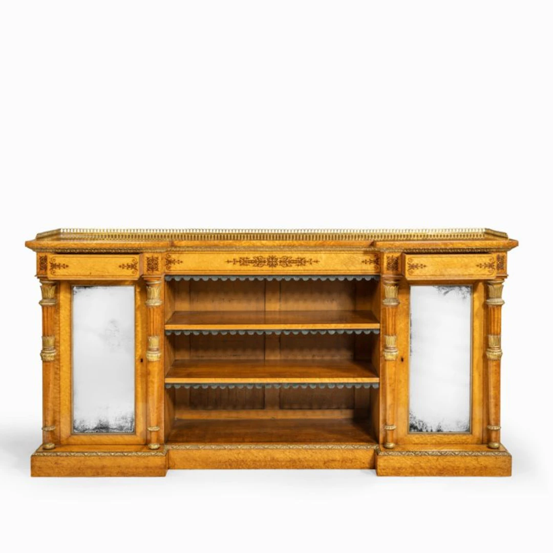A Regency birds eye maple open bookcase