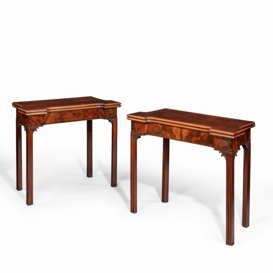 A very fine pair of George III mahogany and plum pudding mahogany