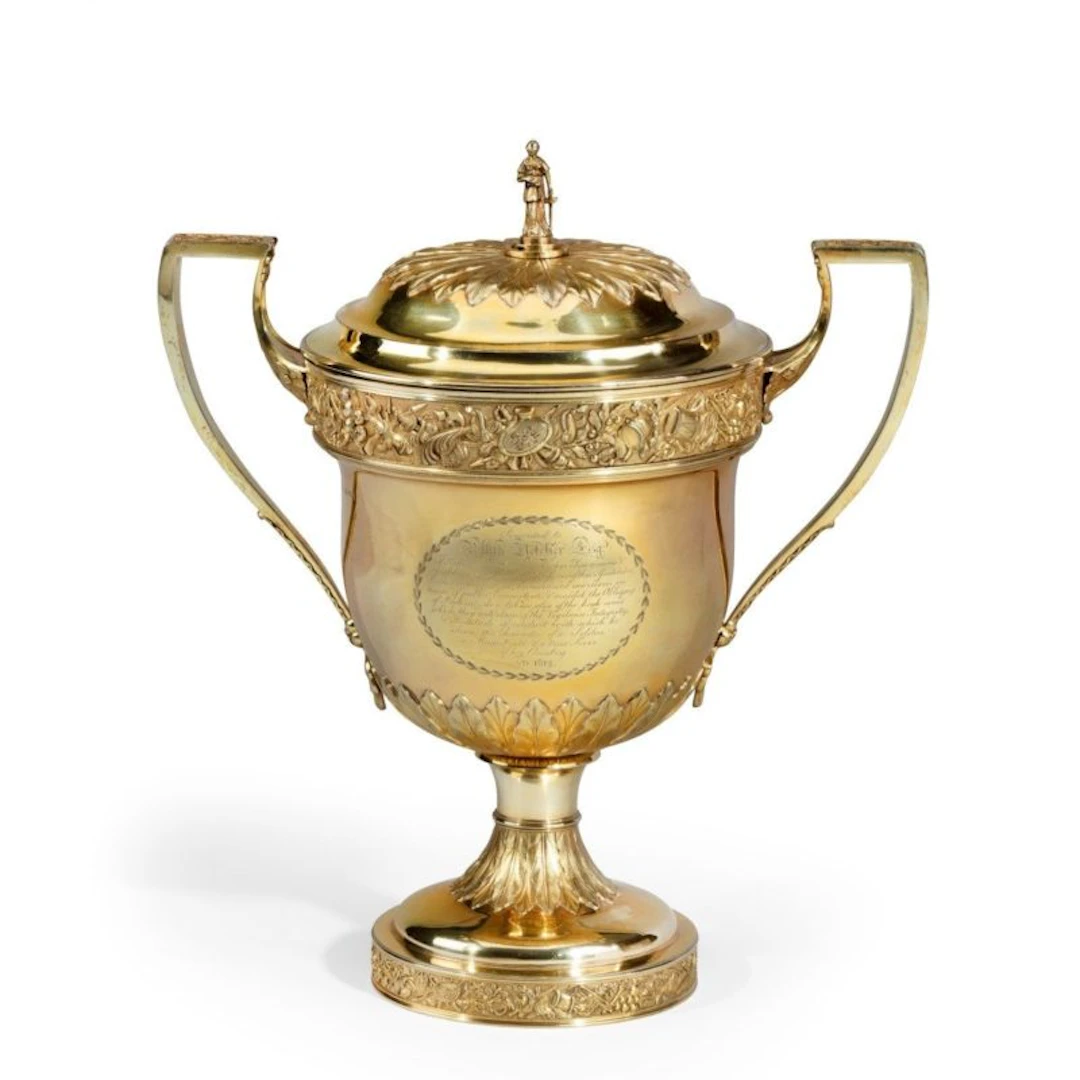 A monumental Regency silver-gilt presentation cup and cover by Peter