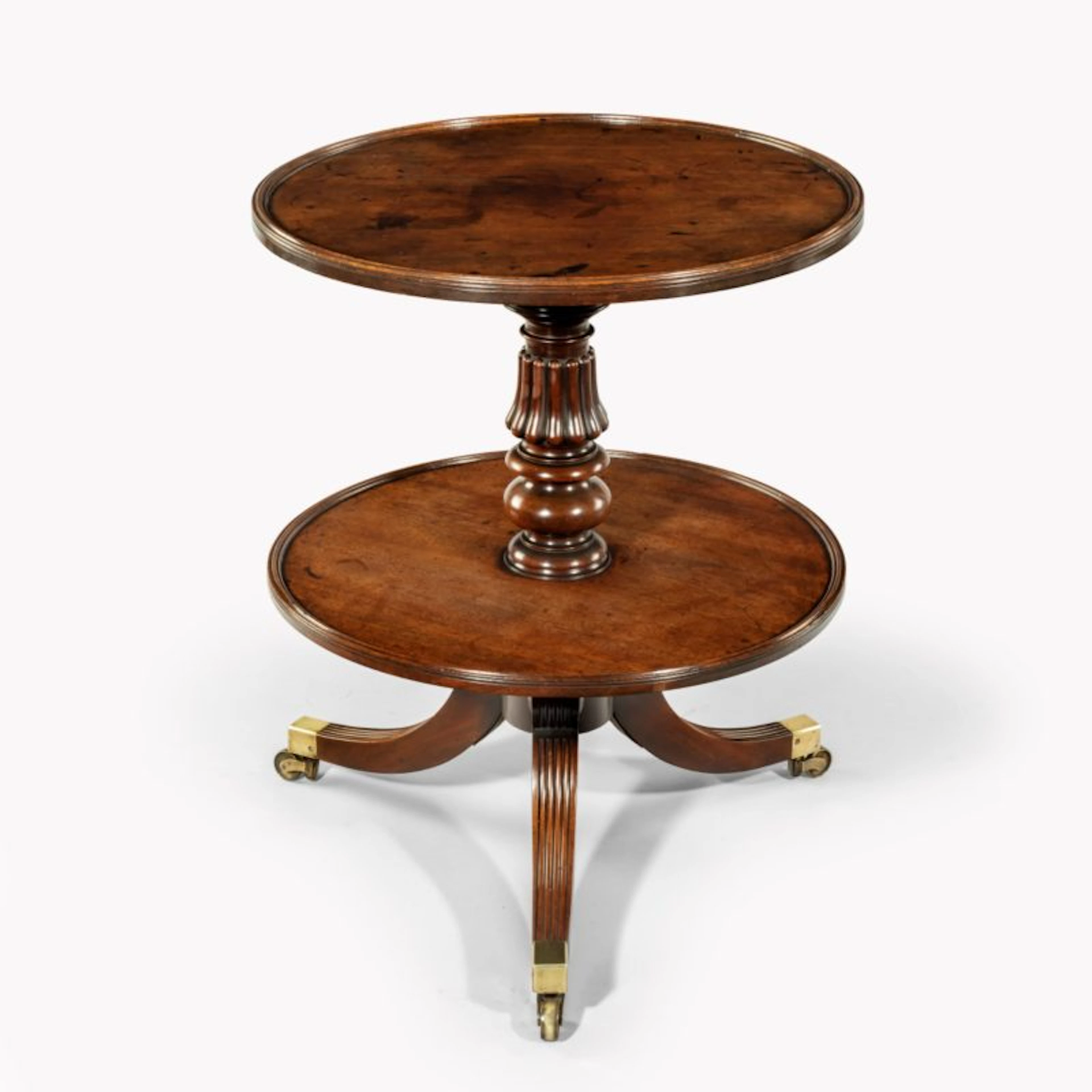A William IV two tier mahogany table attribruted to Gillows