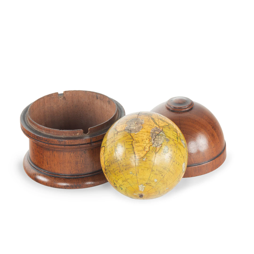A 3 inch 19th Century Newton’s New & Improved terrestrial pocket globe.