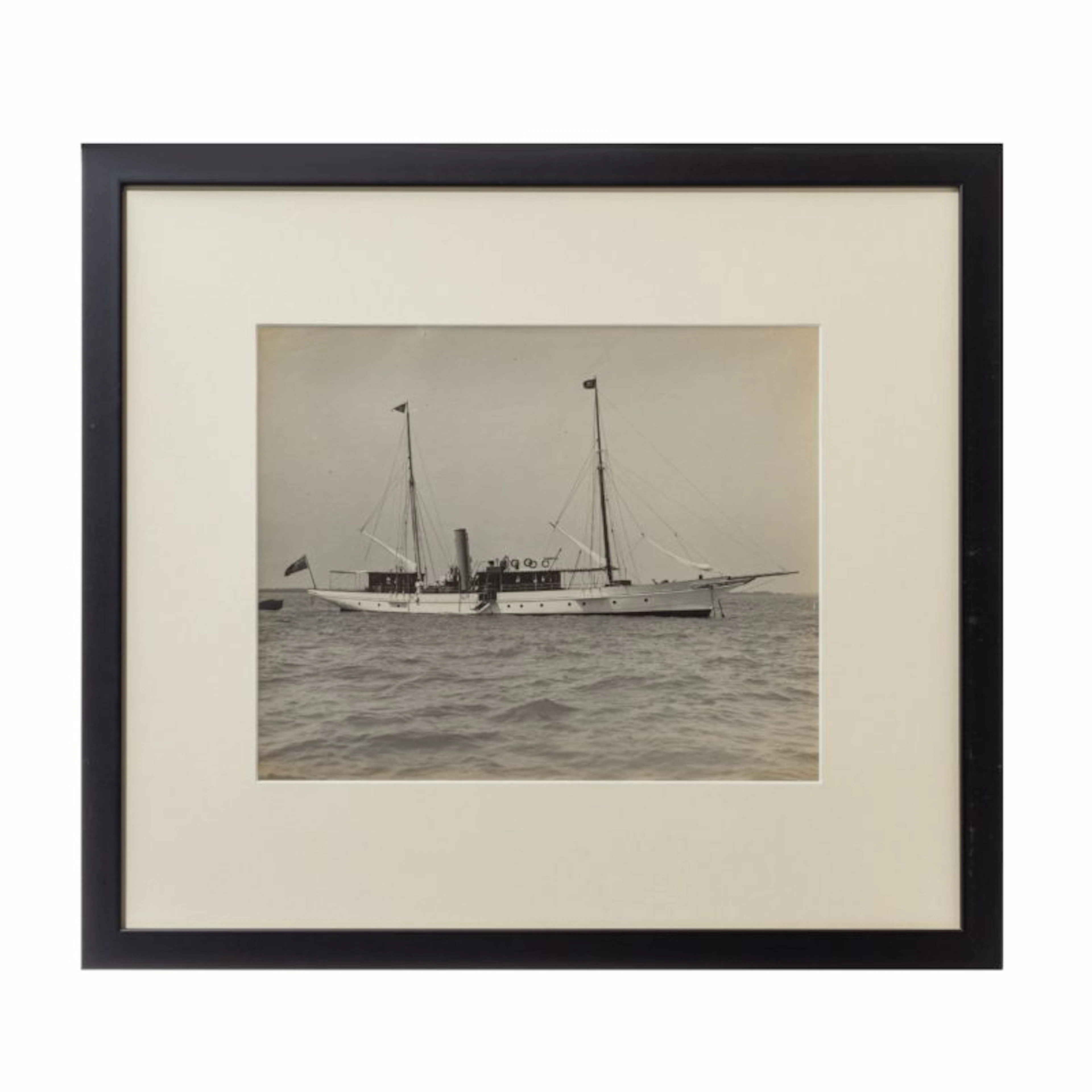 A gelatin print of a beautiful gentleman steam yacht at anchor by W Kirk