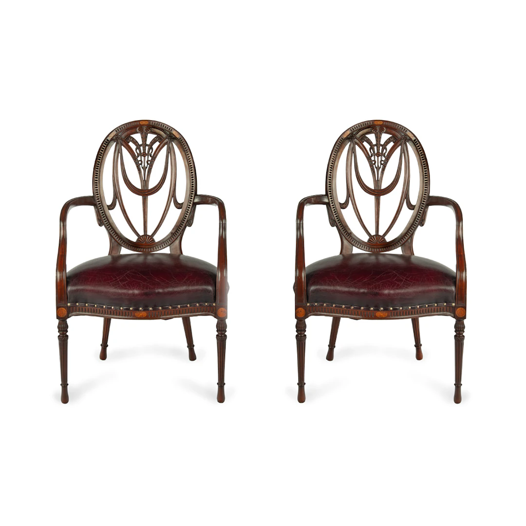 A pair mahogany Hepplewhite style arm chairs