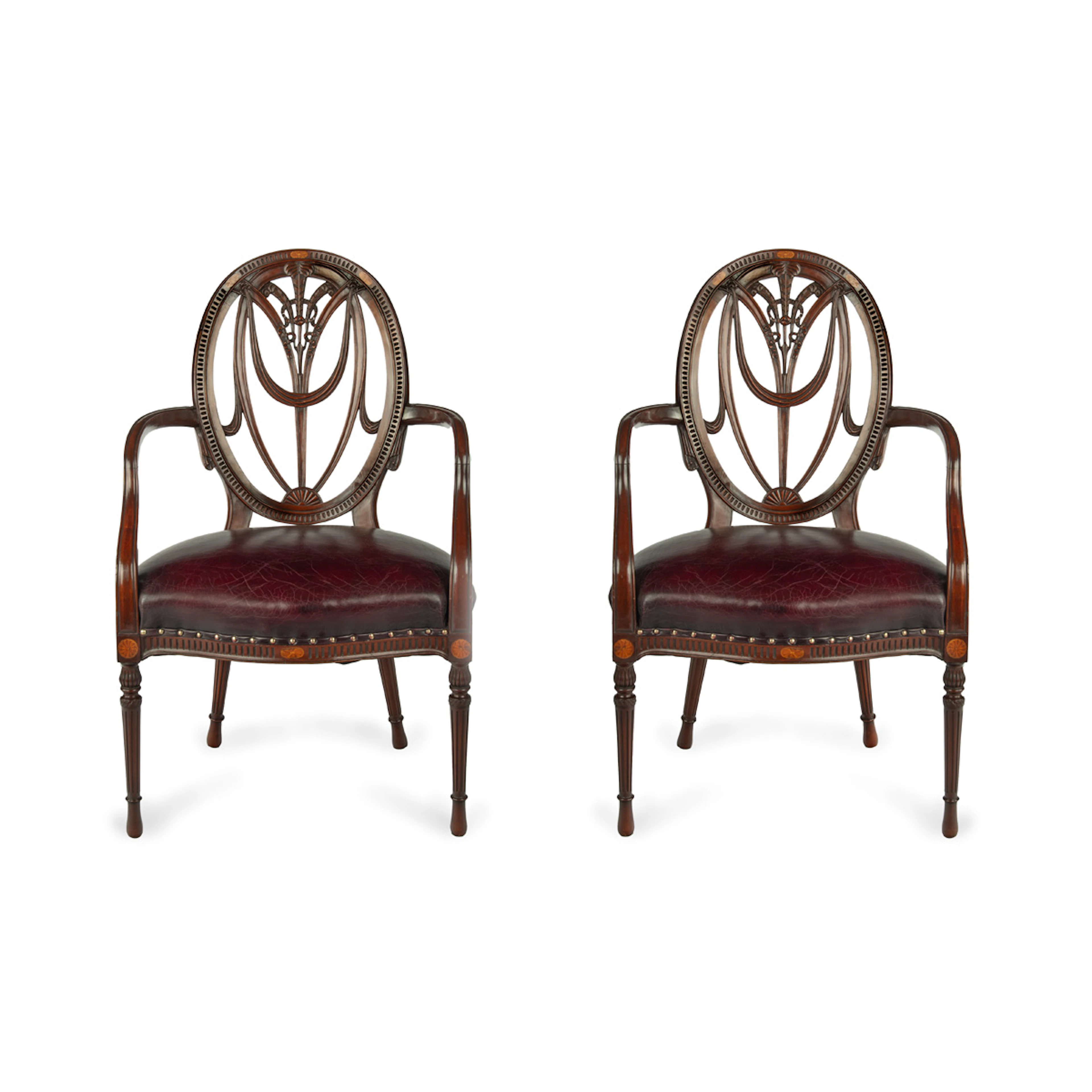 A pair mahogany Hepplewhite style arm chairs