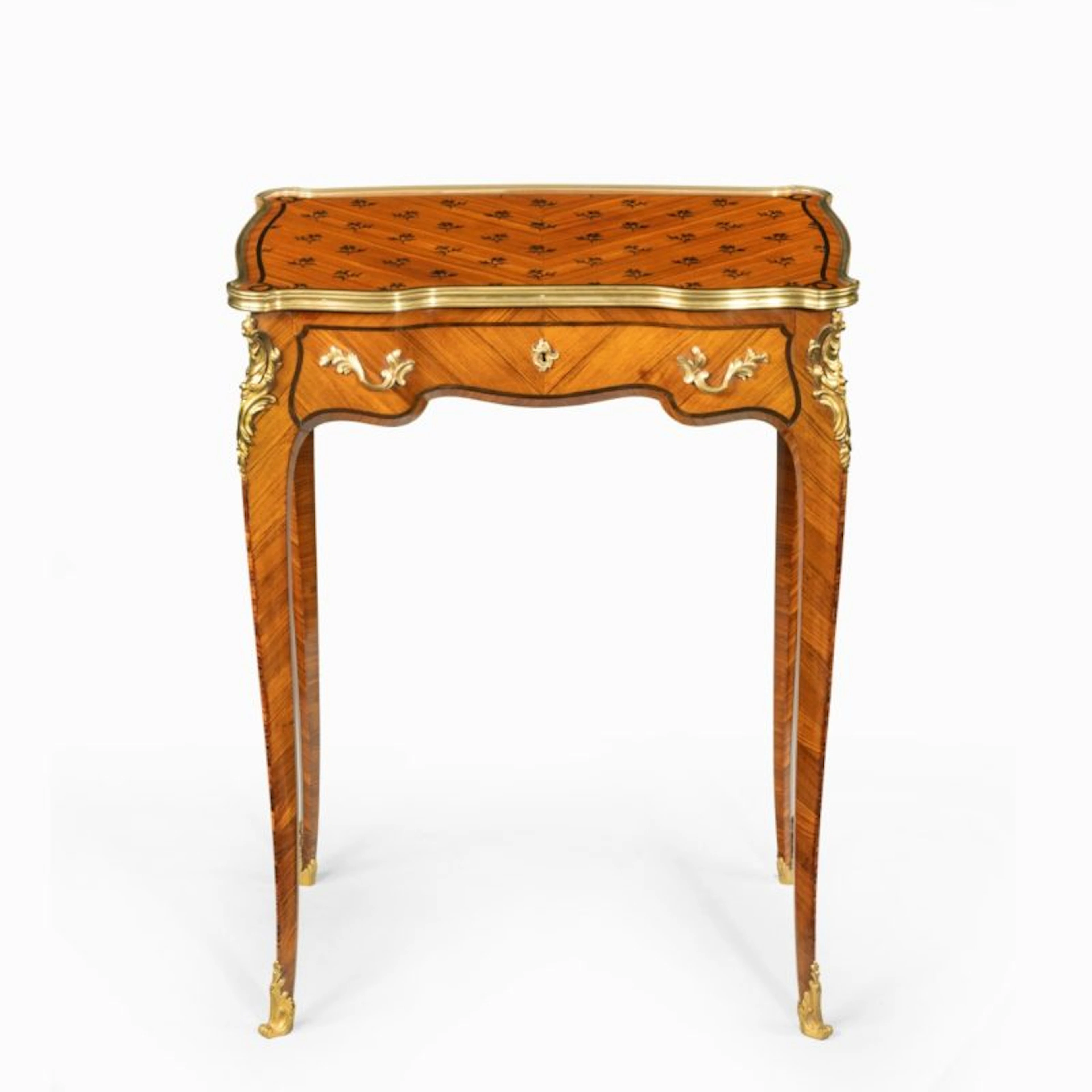 A delicate Napoleon III kingwood parquetry side table attributed to Sormani