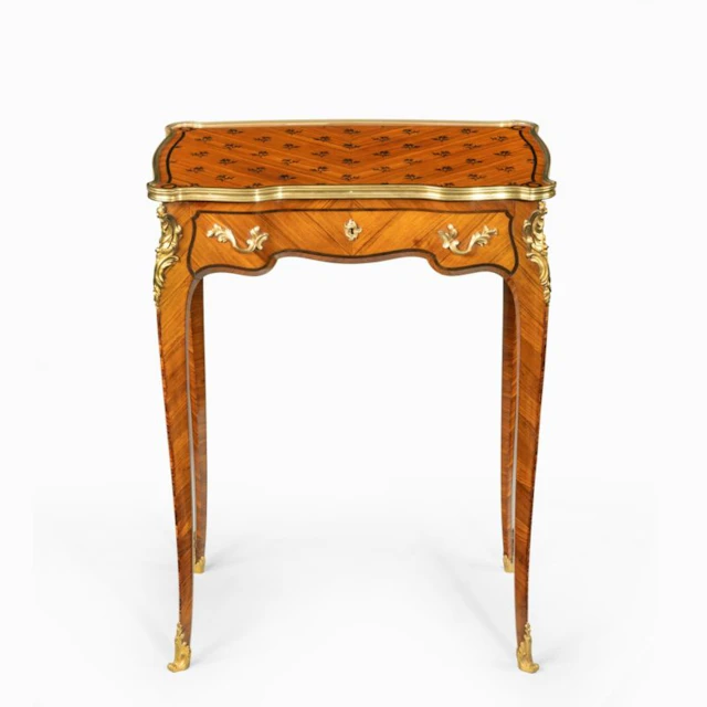 A delicate Napoleon III kingwood parquetry side table attributed to Sormani