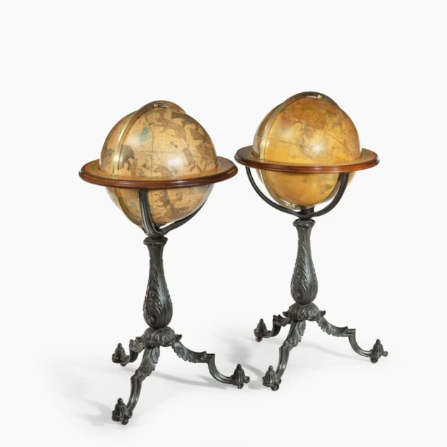 A Pair of 16-inch floor standing globes by Gilman Joslin