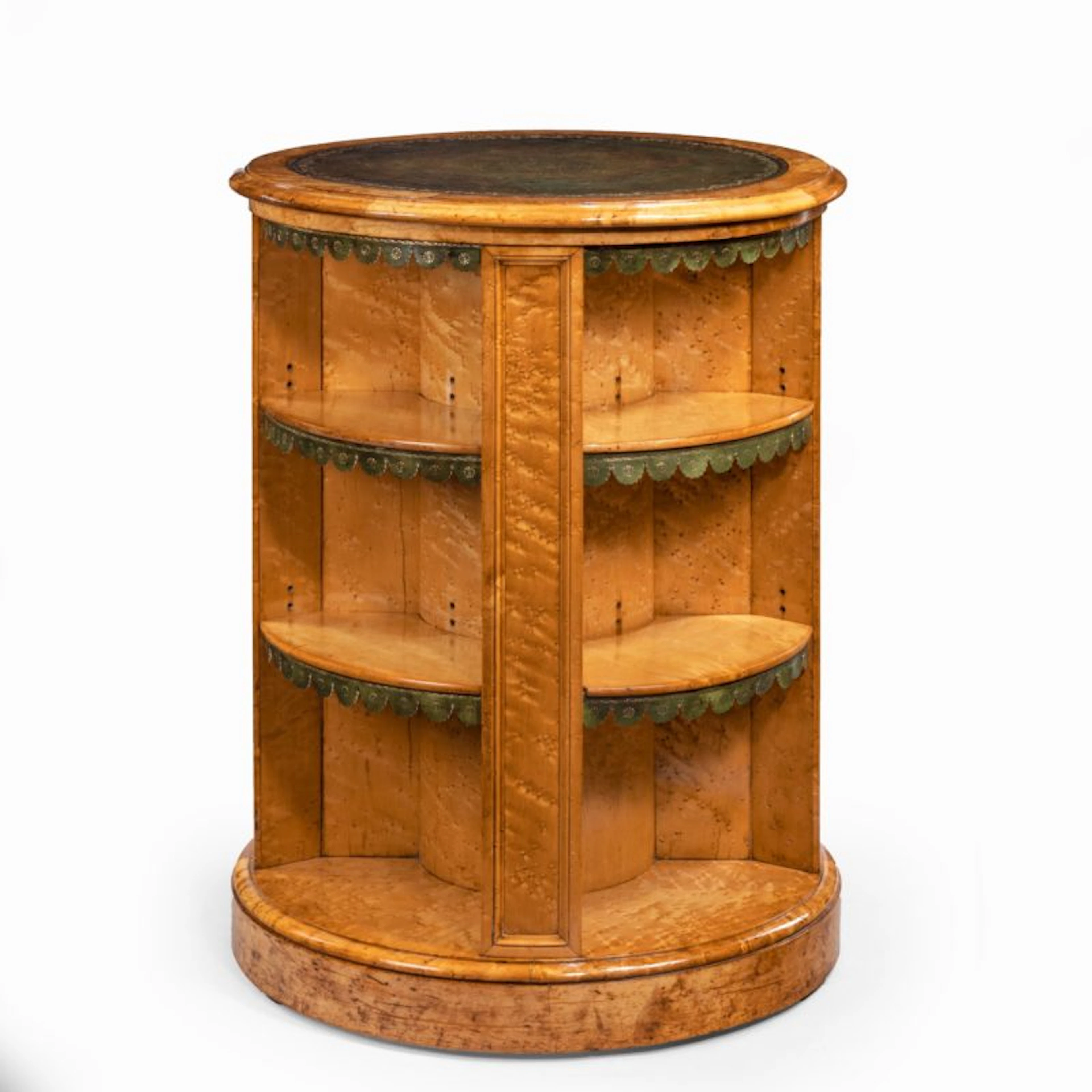 A late Regency bird’s eye-maple cylindrical open bookcase attributed to Gillows