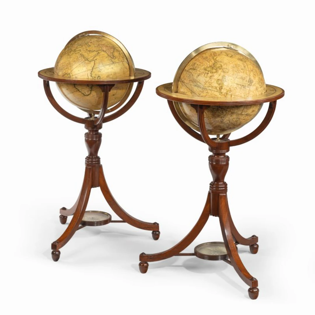 A pair of 12-inch floor globes by Cary
