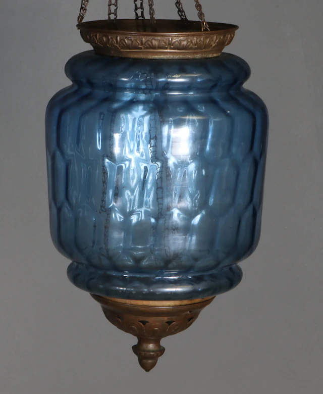 Måneskinnslampe i blått glass.