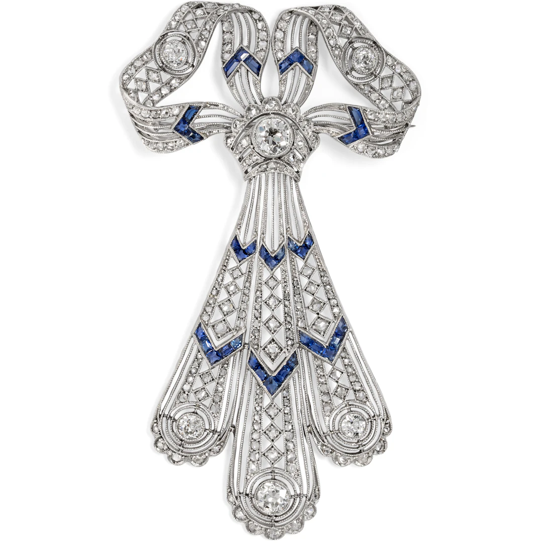 Delicate Edwardian Bow Brooch with Diamonds & Sapphires in Platinum, c. 1910