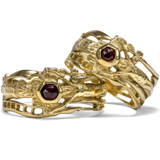 A Pair of Unworn "Luther rings" Made of Gold with Rose-Cut Garnets