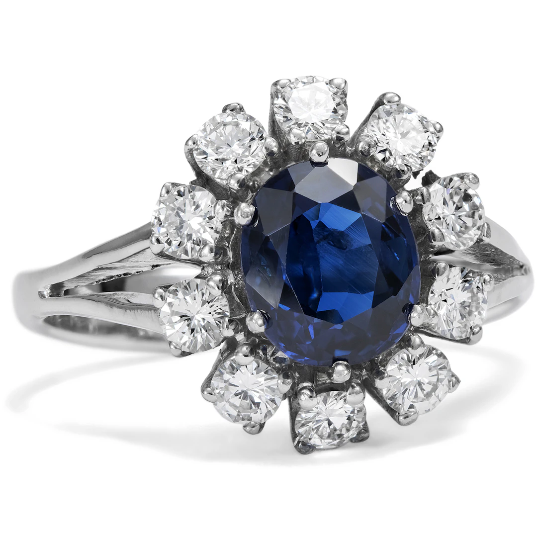 Sparkling Vintage Sapphire Ring With Entourage of Diamonds in White