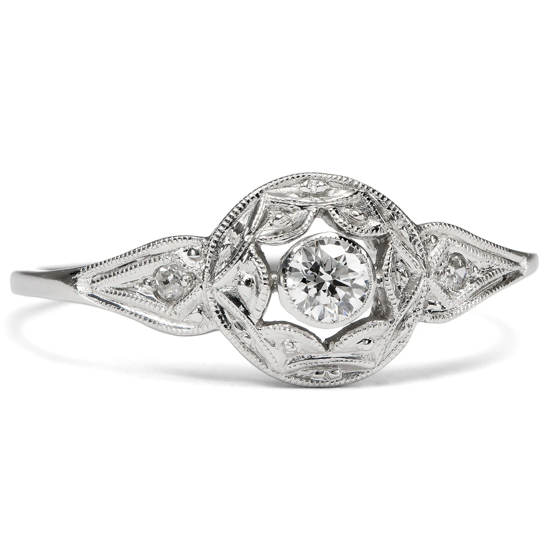 A Sparkling Platinum Ring with 0.10 ct Top Wesselton Brilliant, from
