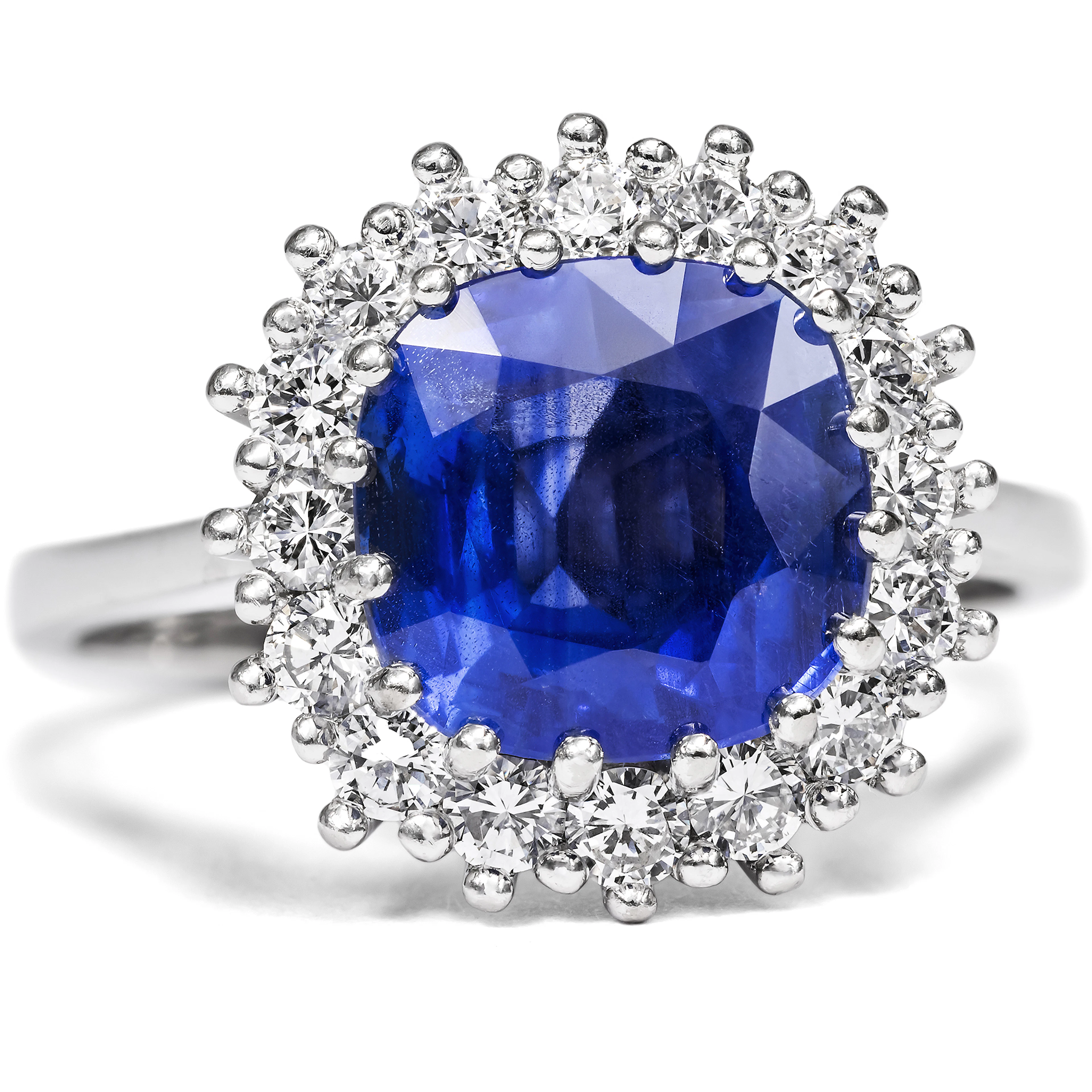 Precious entourage ring with untreated sapphire & diamonds, ca. 1975