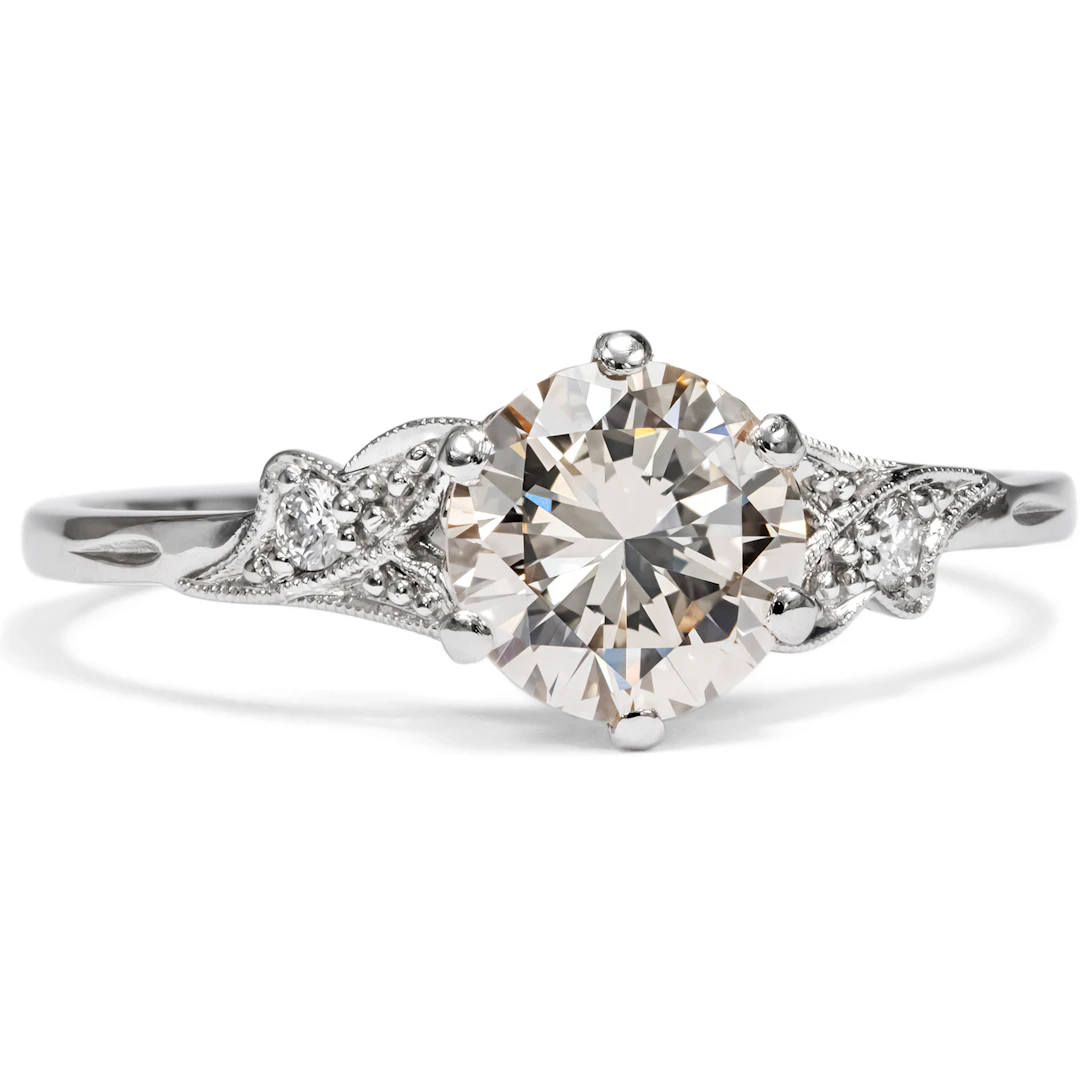 Platinum Ring with a Lightly Tinted Colour 0.96 Ct Diamond, Made in