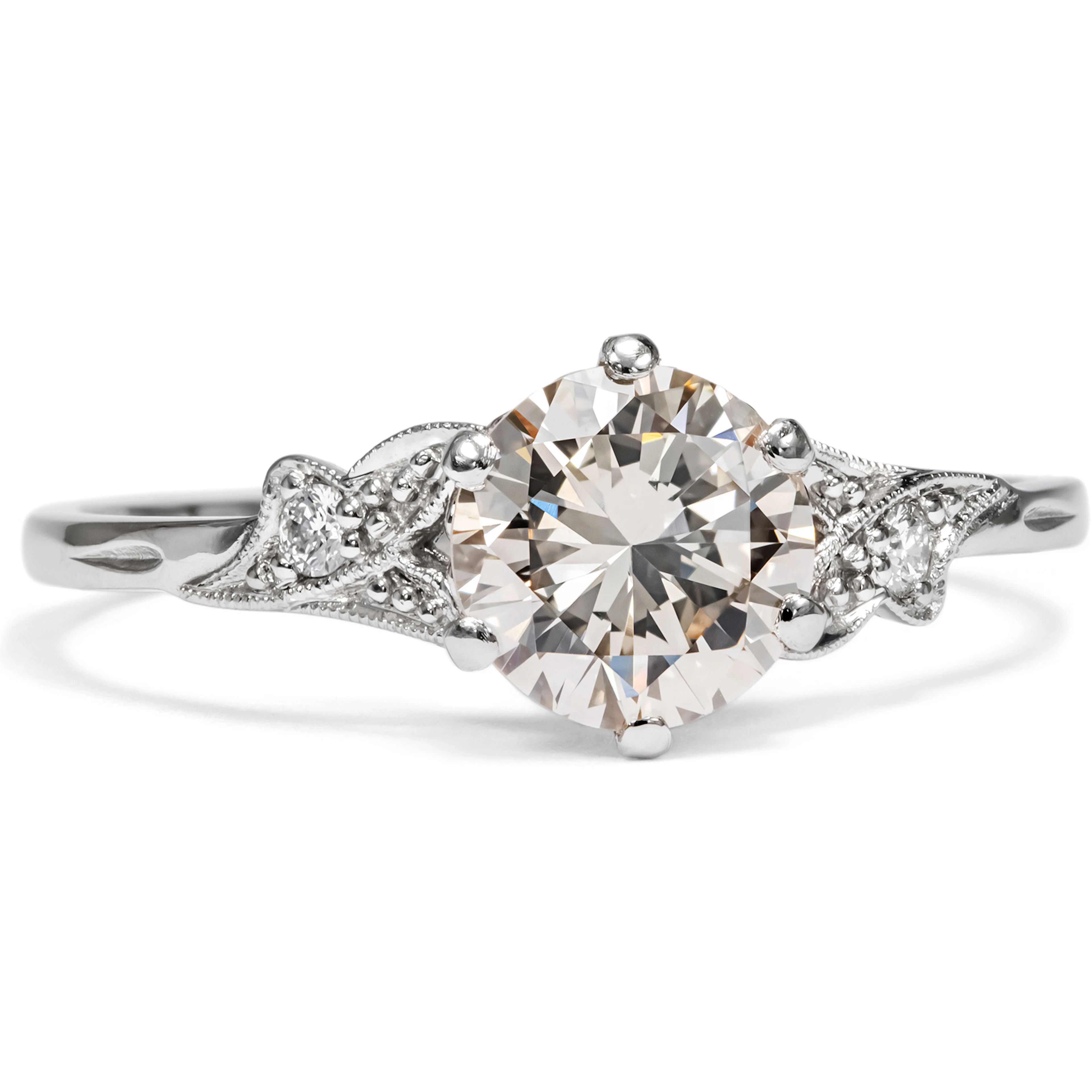 Platinum Ring with a Lightly Tinted Colour 0.96 Ct Diamond, Made in