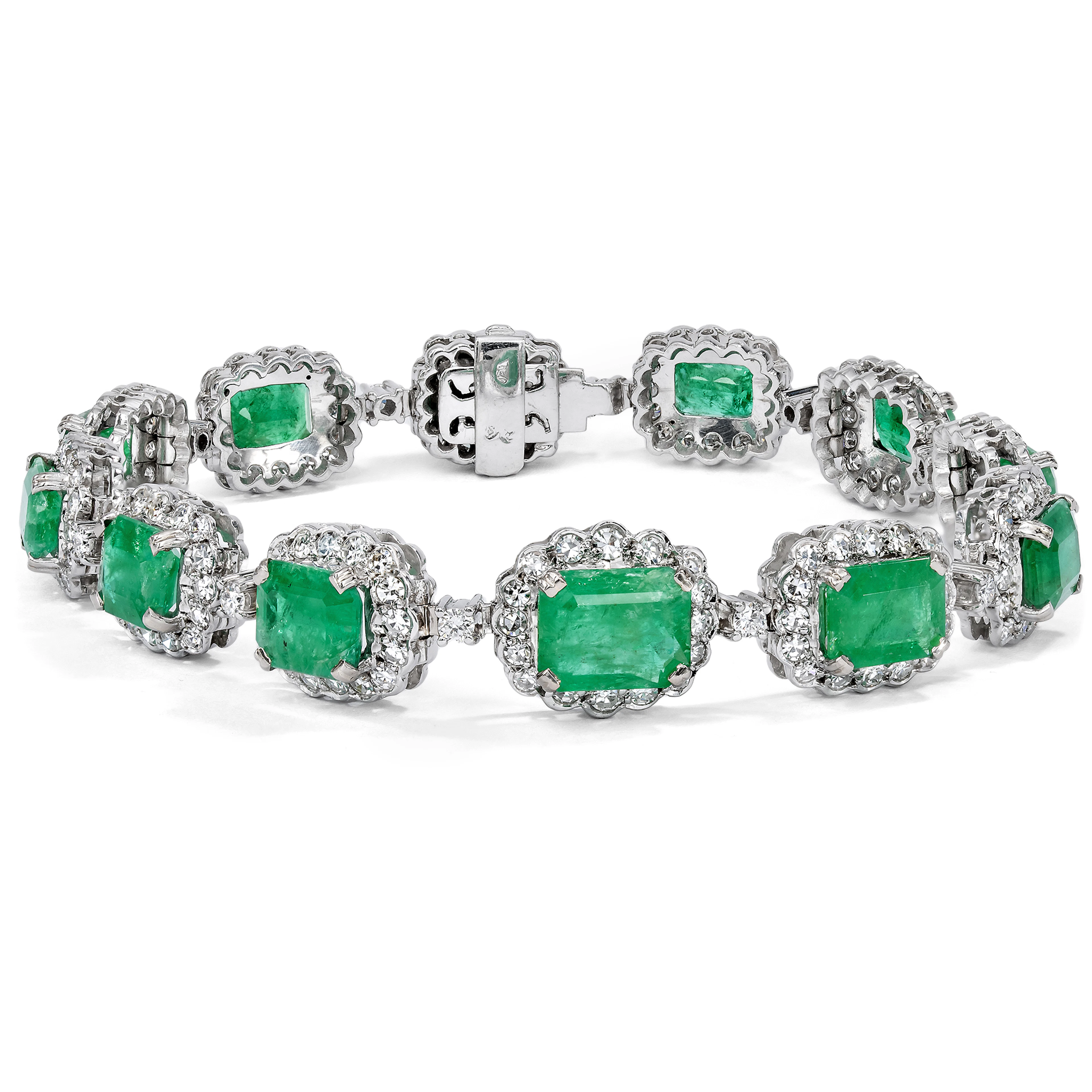 Luxurious Vintage Emerald and Diamond Cluster Bracelet in White Gold, c. 1960s