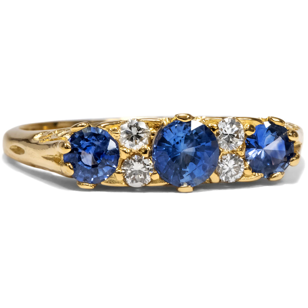 Unworn gold ring with sapphires & diamonds from our workshop