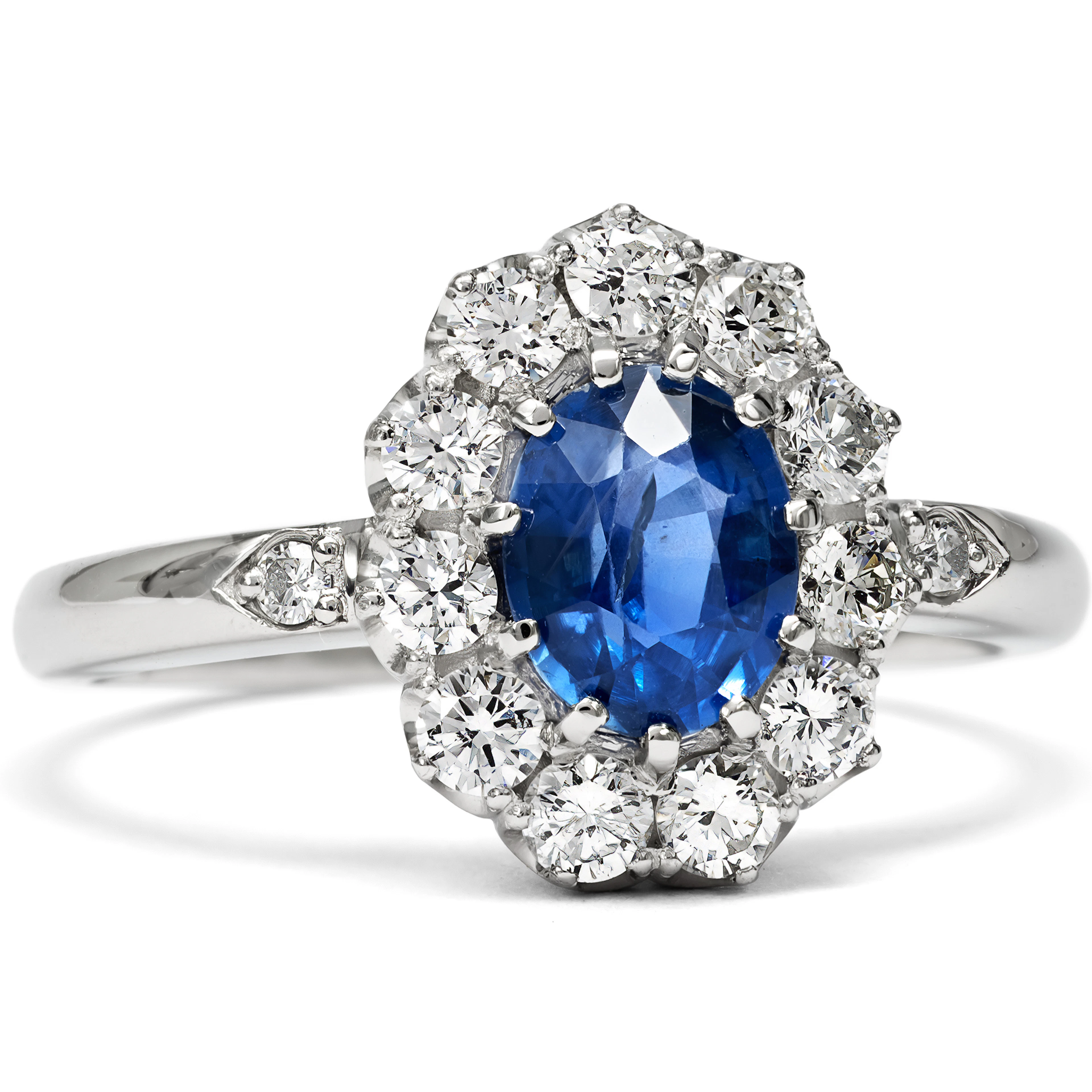 Elegant Ring with an Untreated Sapphire and Brilliant-Cut Diamonds