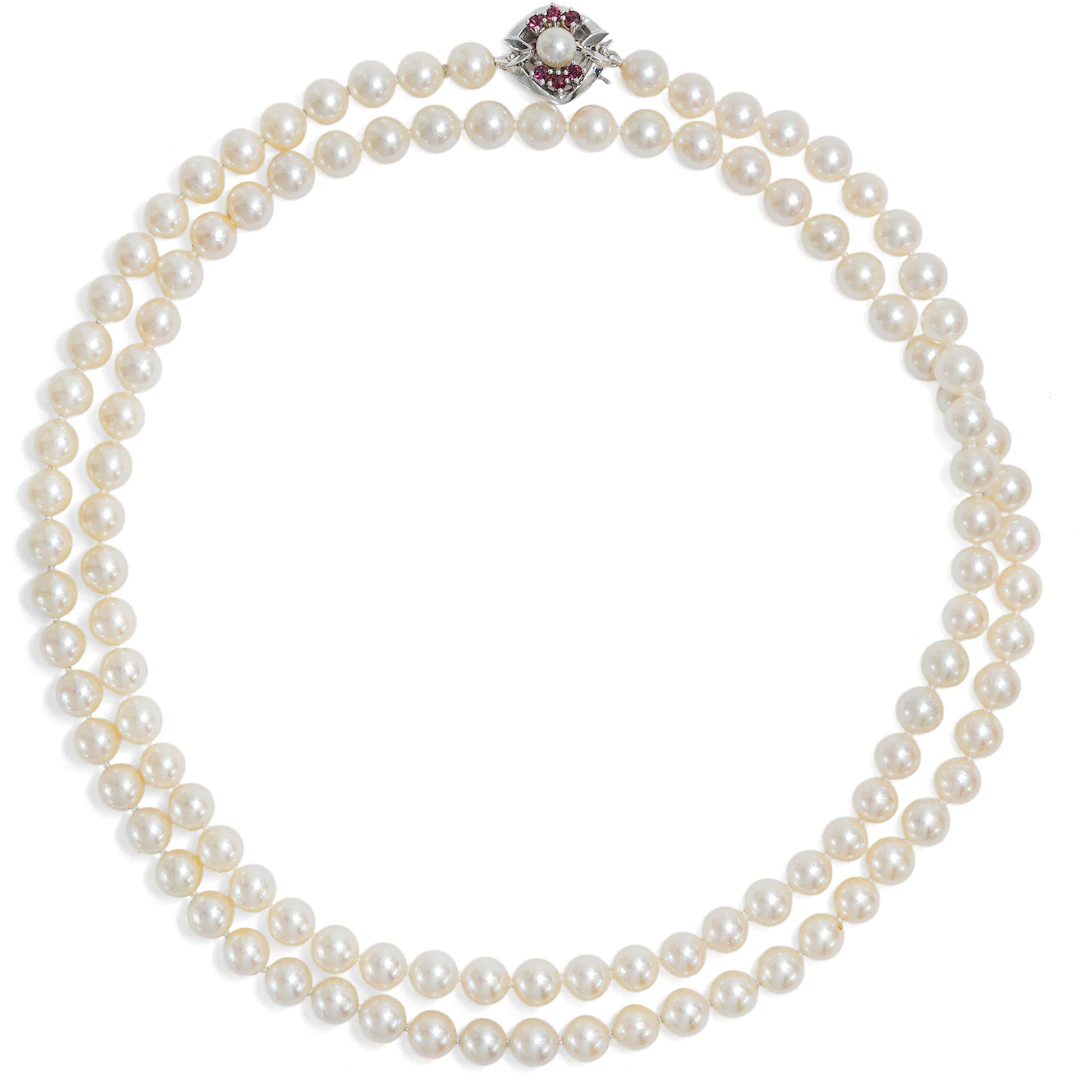 Elegant Opera Length Akoya Pearl Necklace with White Gold & Ruby Clasp, c. 1980