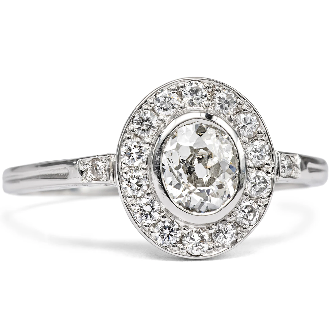 Delicate Platinum Ring with a Diamond in the Old Cut and Brilliant-Cut