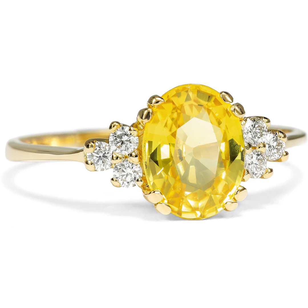 Delicate Ring with a Yellow Ceylon Sapphire and Diamonds in Gold
