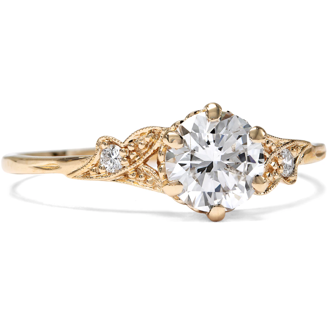 Delicate Rose Gold Ring with a 0.70 Ct Vintage Brilliant, from our Workshop