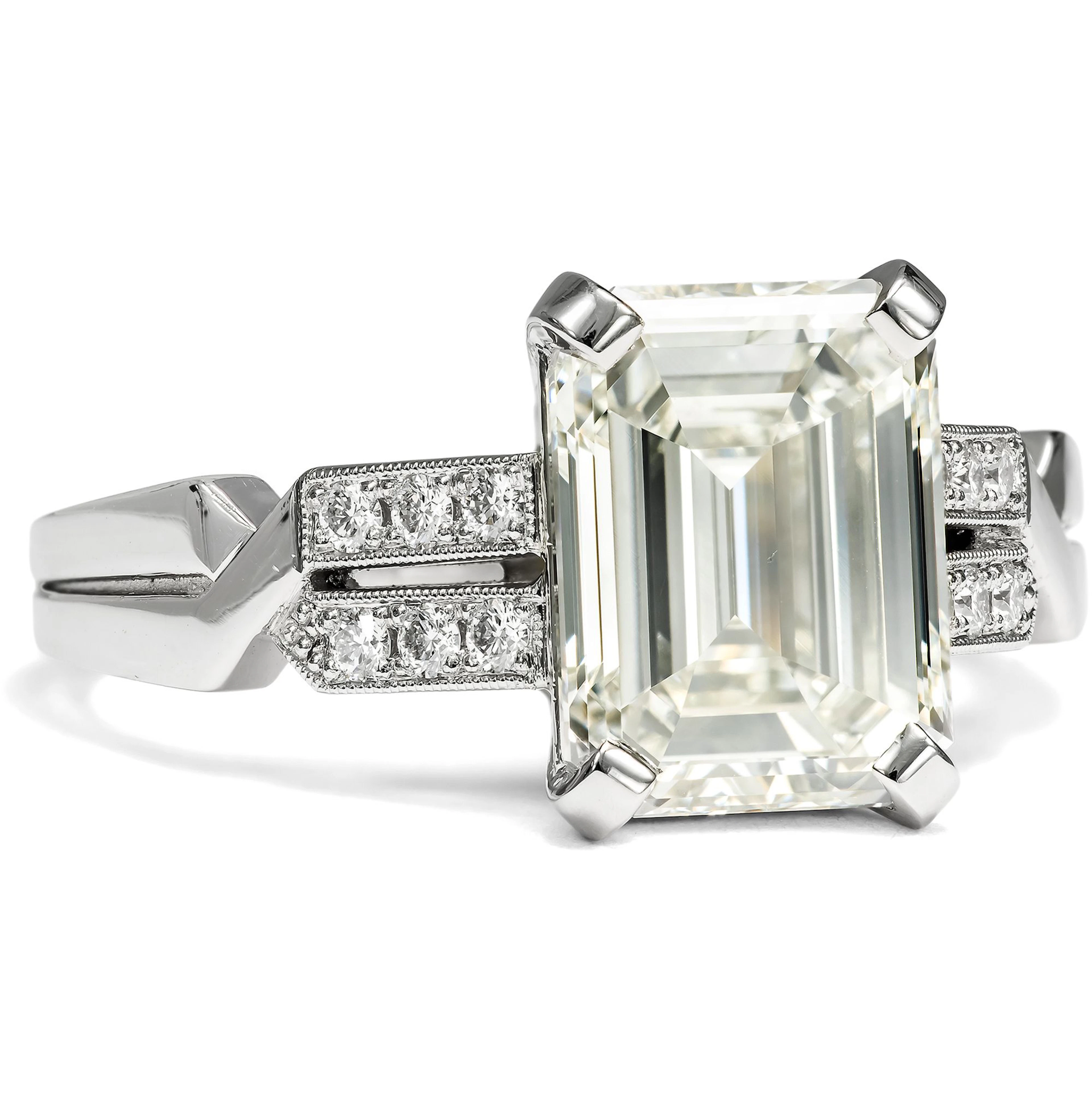 Exquisite Ring with a 3.03 Ct Emerald-Cut Diamond in Platinum, From