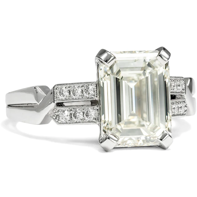 Exquisite Ring with a 3.03 Ct Emerald-Cut Diamond in Platinum, From