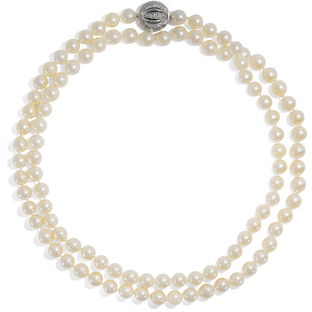 Elegant Opera Length Pearl Necklace With White Gold Diamond Clasp, c. 1975