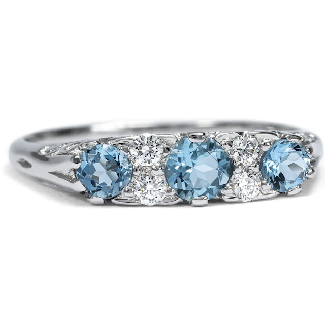 Unworn platinum ring with aquamarines & diamonds from our workshop