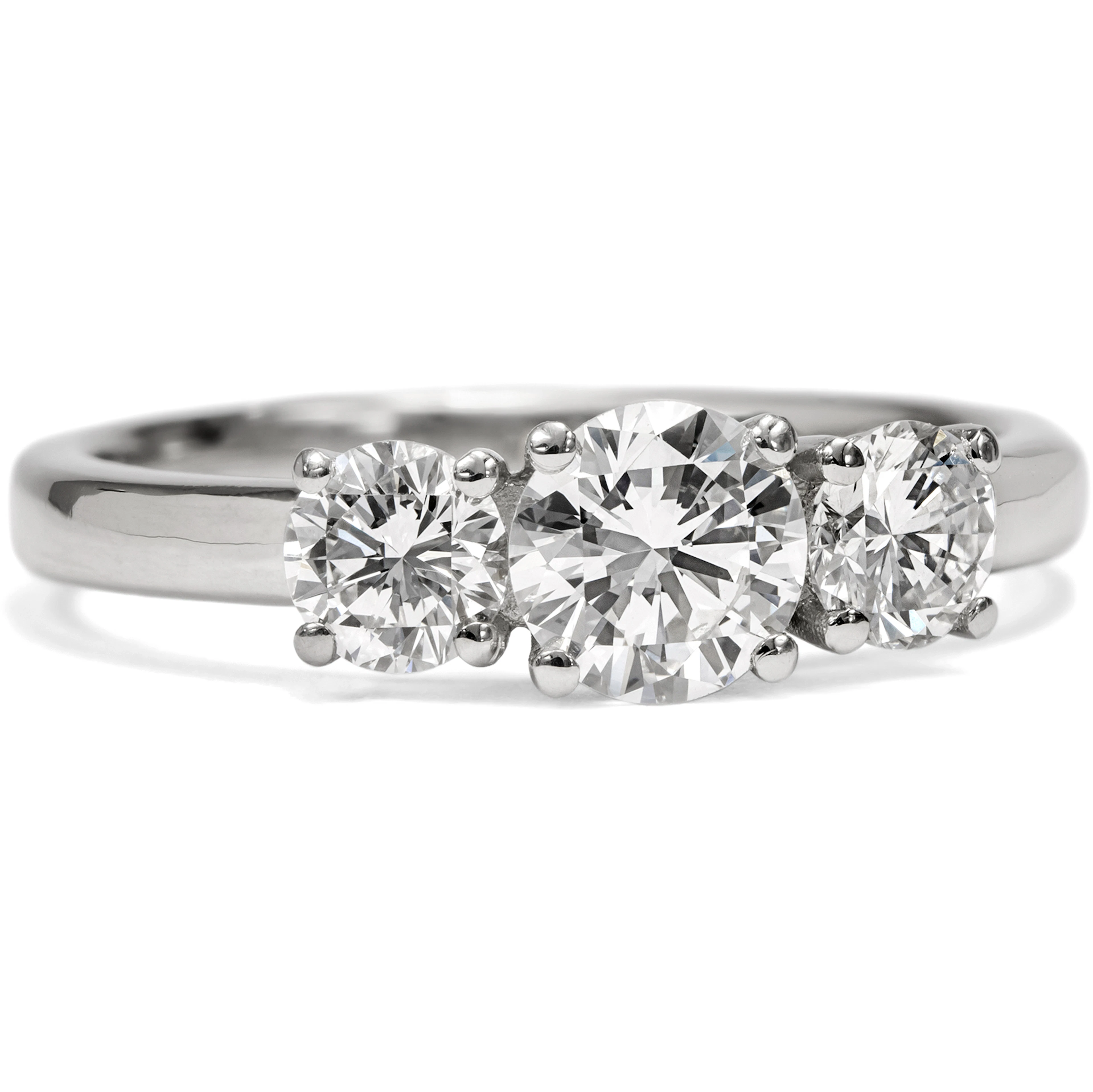 Unworn "Trilogy" ring with vintage diamonds in platinum, from our workshop