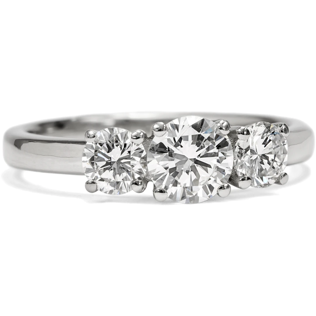 Unworn "Trilogy" ring with vintage diamonds in platinum, from our workshop