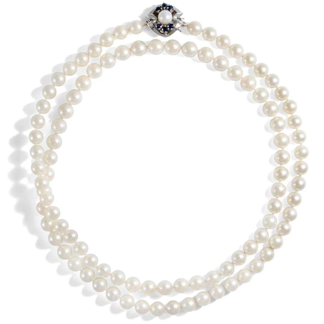 Elegant Opera Length Pearl Necklace With White Gold & Sapphire Clasp, c. 1980