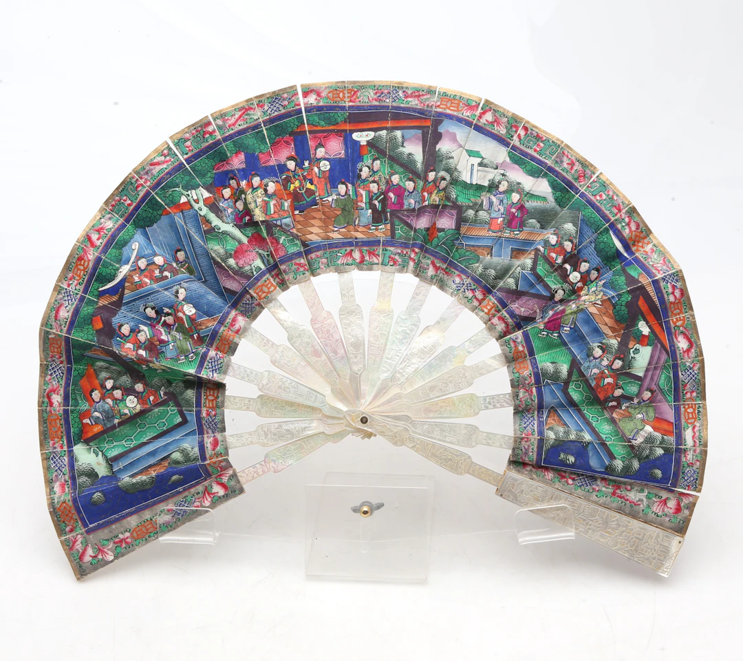 Chinese "thousand faces" fan with carved mother-of-pearl sticks and