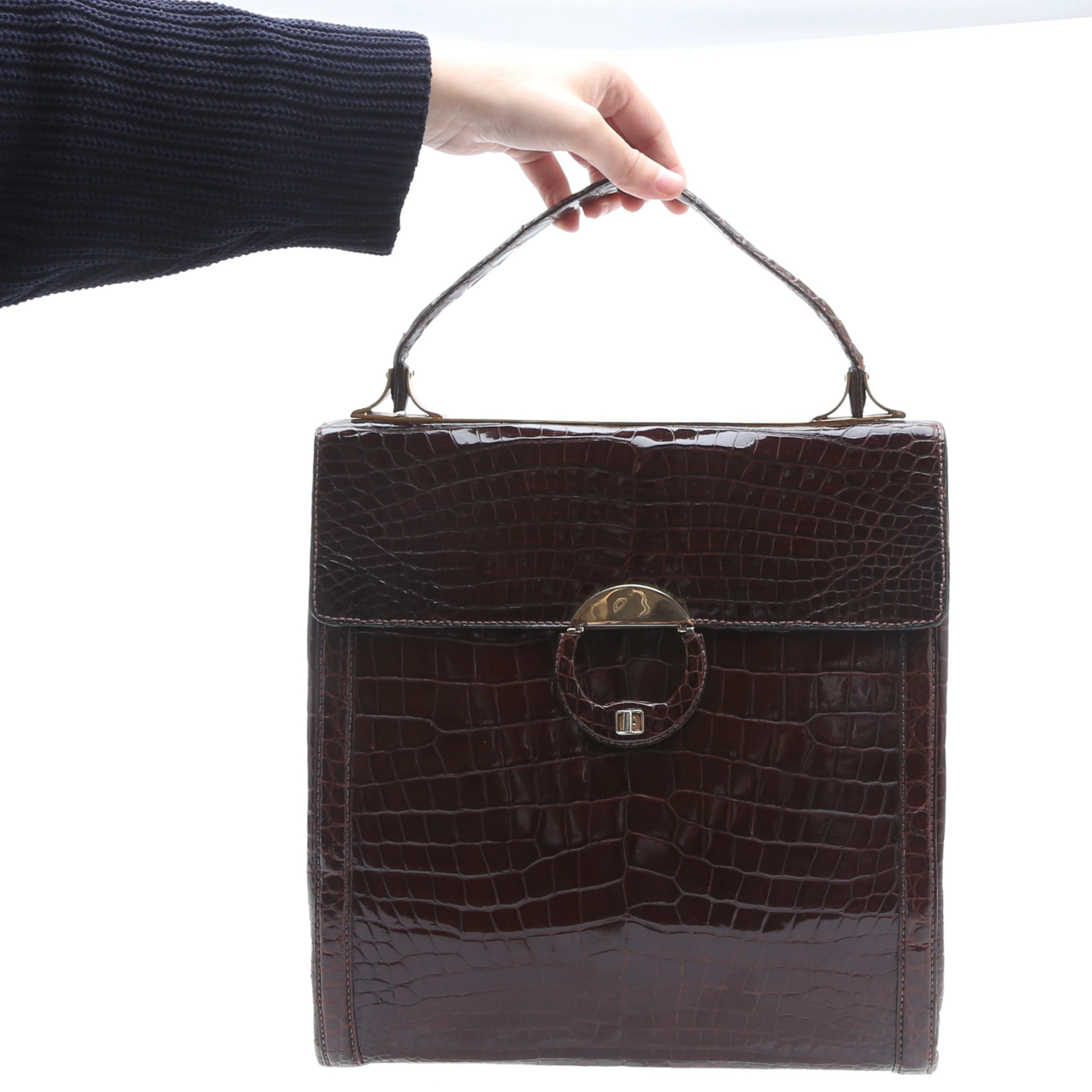 Vintage Loewe reptile imitation leather bag, 1956.