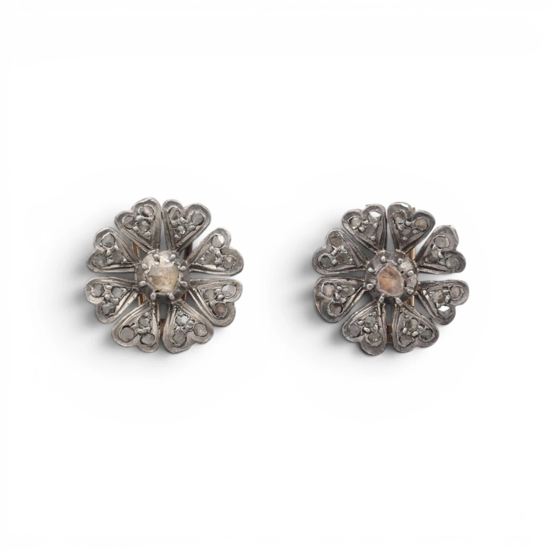 Pair of diamonds floral clip-brooches, late 19th Century.