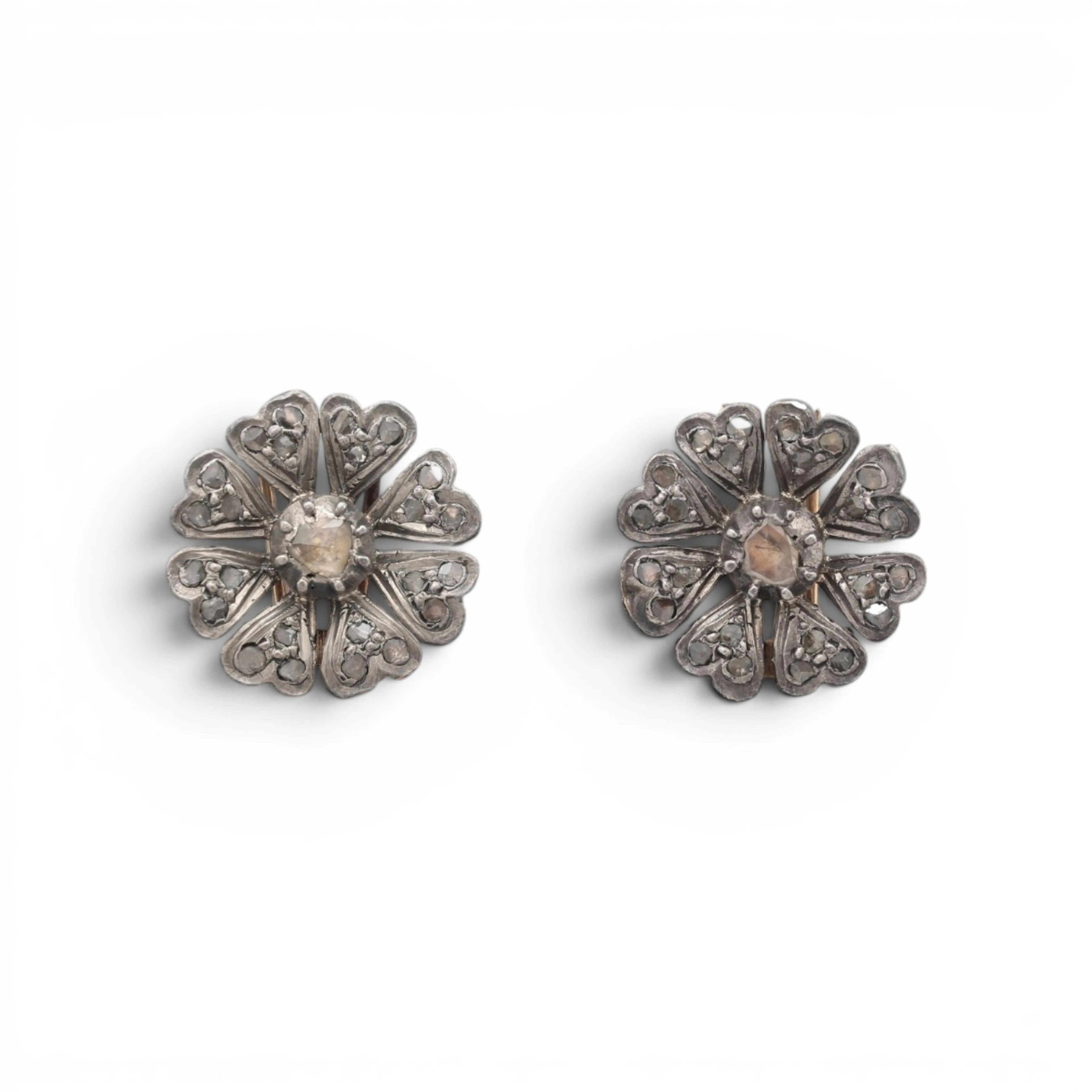 Pair of diamonds floral clip-brooches, late 19th Century.