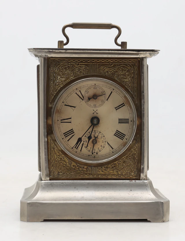 French travel clock in brass, early 20th Century.