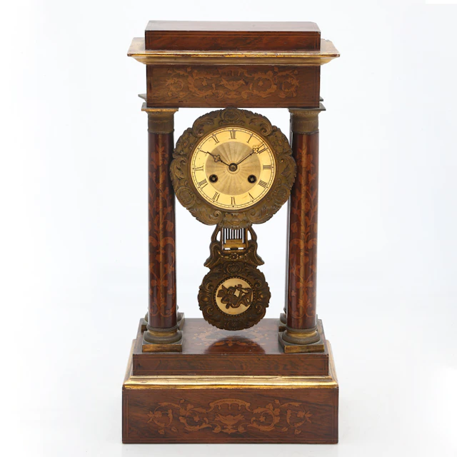 Louis Philippe portico clock in mahogany with marquetry, circa 1850.